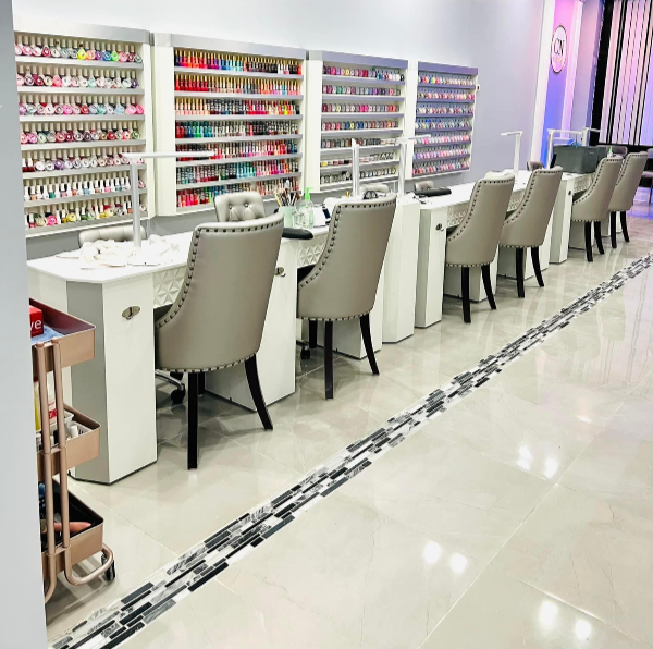 The polish wall and manicure tables at Central Nails